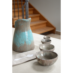 A set of four ceramic raku bowls